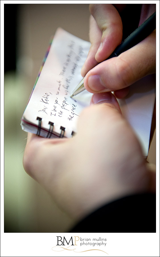 call_rose-0033 Groom writing a note before the wedding