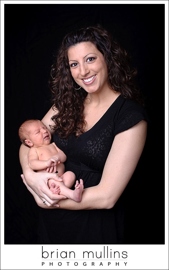 Mommy and baby on black