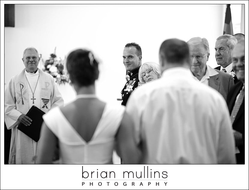 Groom sees bride at wedding on Lake Gaston