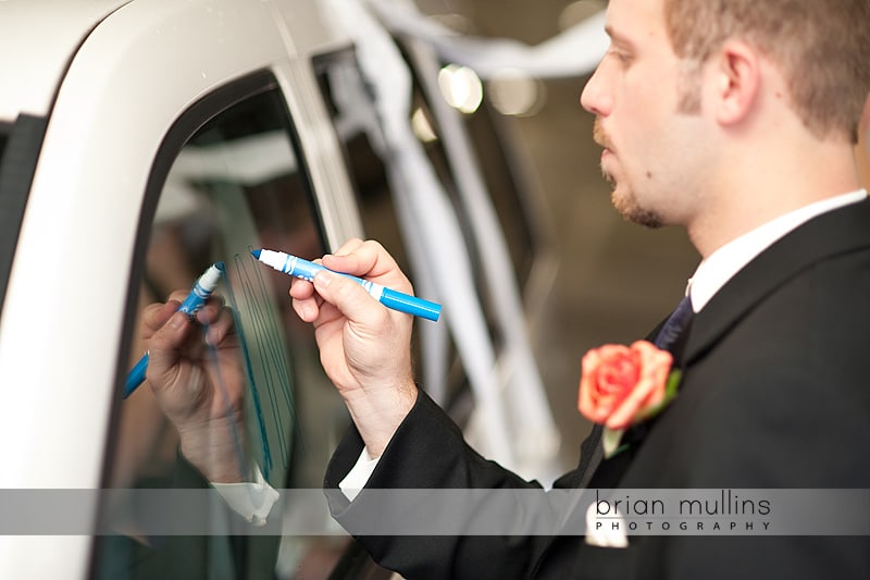 wedding photography of car getting trashed