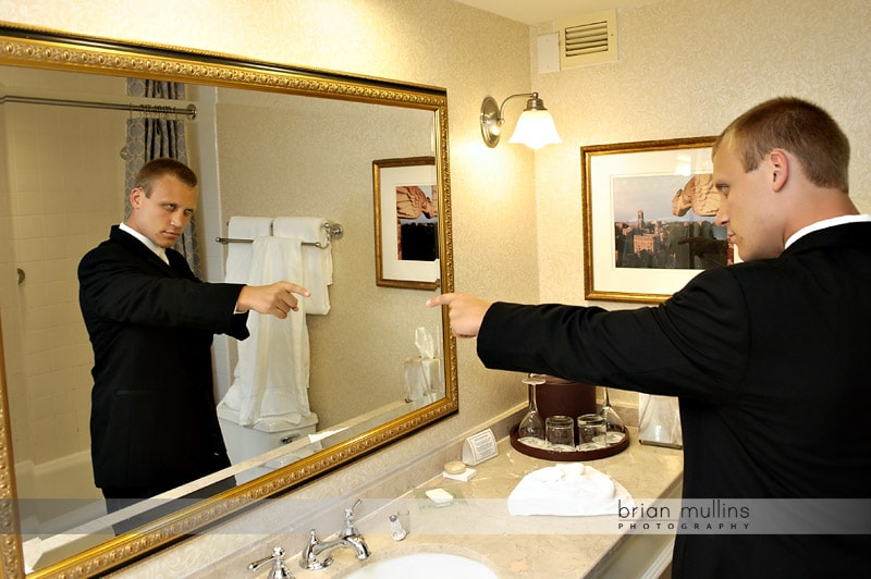 groom getting pumped up for wedding