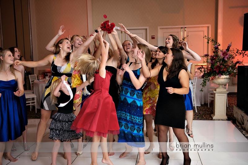 bouquet toss at wedding reception