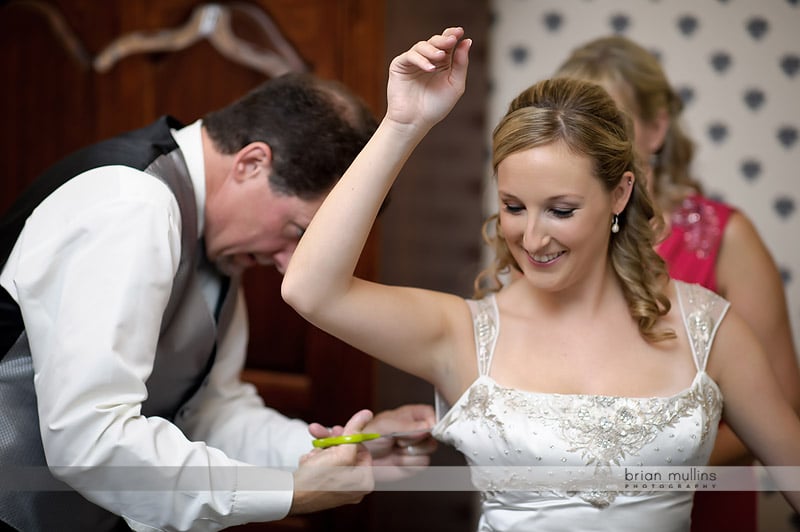 dad helping daughter getting ready