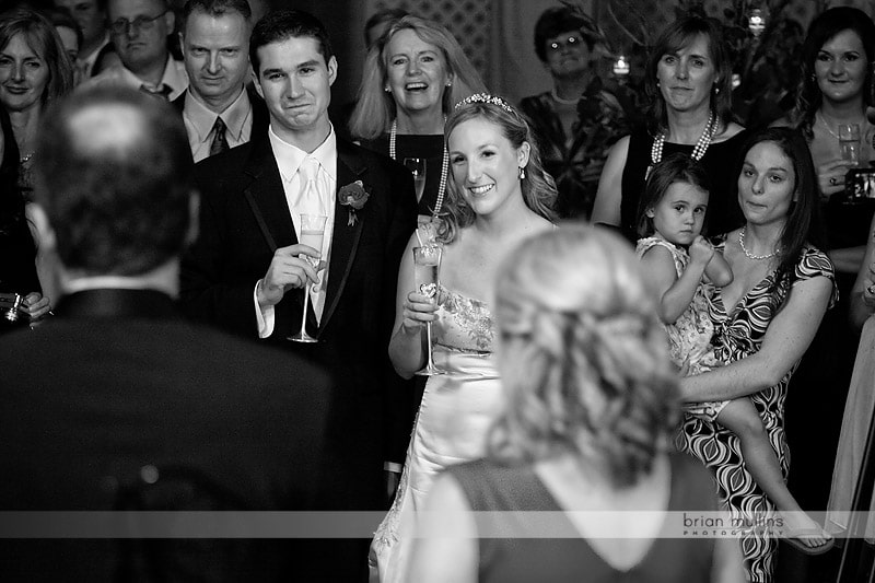 father toasting bride and groom