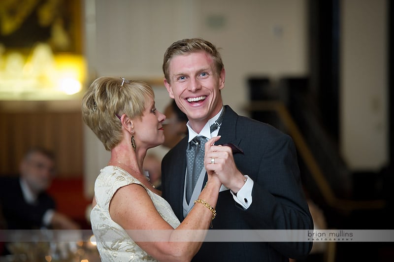 groom dancing with mother