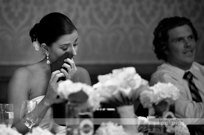 bride crying during wedding toast