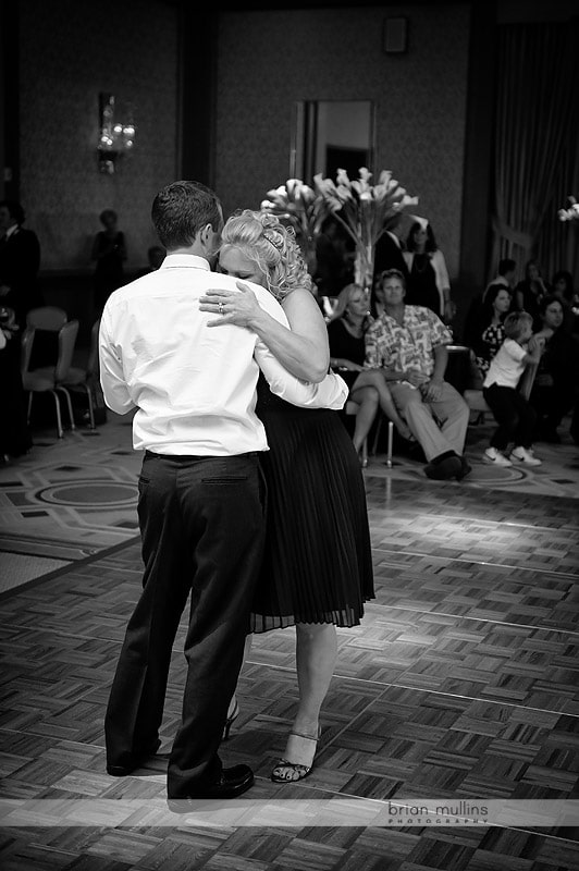 groom dancing with mother