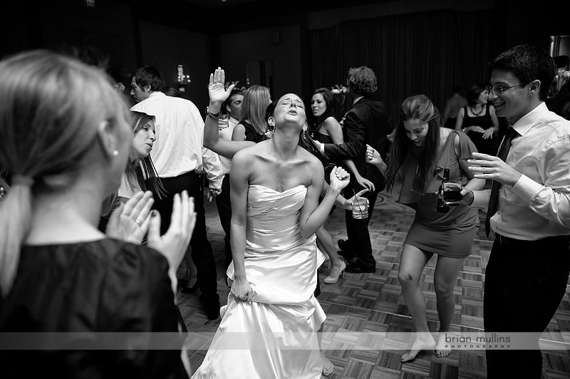 bride singing at wedding reception