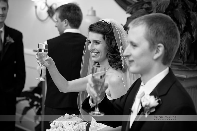 bride and groom toasting
